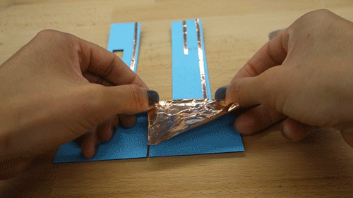 Animation of sticking down the copper pads.
